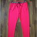 Under Armour Bottoms | Girl's Under Armour Heat Gear Loose Fitting Athletic Pants Size Yxlarge | Color: Pink | Size: Xlg