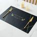 Umber Rea Waterproof 2 Piece Leather Placemat Set Leather in Black | 11.8 H x 17.7 W in | Wayfair 05WDN7327MIWMHV5061