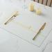 Umber Rea 4 Piece Placemat Set Leather in White | 17.7 W x 11.8 D in | Wayfair 03WDN7327MMGN163FO7