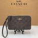 Coach Bags | Coach Double Corner Zip Wristlet In Signature Canvas Color: Gold/Brown Black | Color: Black/Brown | Size: 6 1/2" (L) X 3 3/4" (H)