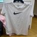 Nike Shirts & Tops | Nike Girls Size Large White V-Neck Short Sleeve Dri Fit T-Shirt Black Nike Check | Color: Black/White | Size: Lg