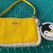Coach Bags | Coach Pebbled Leather With Shearling Wristlet With Matching Penguin Bag Charm | Color: Yellow | Size: Os