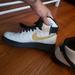 Nike Shoes | Like New Nike Shoes . White Black And Tan .Size 8 1/2 | Color: Gold/White | Size: 8.5