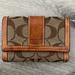 Coach Bags | Coach Brown/Tan Leather Wallet In Signature C | Color: Brown/Tan | Size: 5 X 3.5