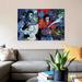 East Urban Home 'Beyond the Masks' Graphic Art Print on Canvas Metal in Blue/Red | 26 H x 40 W x 1.5 D in | Wayfair