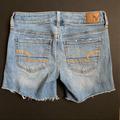 American Eagle Outfitters Shorts | American Eagle Outfitters Distressed Midi Super Super Stretchy Shorts 4 Blue | Color: Blue | Size: 4