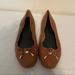 Coach Shoes | Coach Brown & Gold Studded Bow Lara Flat Size 8.5 Women’s | Color: Brown/Gold | Size: 8.5