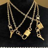 Louis Vuitton Accessories | Louis Vuitton Lv Lock Key Set Plus A 55-Inch Gold Tone Chain #302 #302 #315 #321 | Color: Gold/Tan | Size: Os