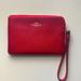 Coach Bags | Coach Brand Corner Zip Wristlet In Red | Color: Red | Size: 6 1/4”(L) X 4” (H) X 1/2”(W)