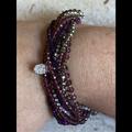 Anthropologie Jewelry | Anthropologie Serefina 10 Strand Magnetic Purple Crystal Bead Bracelet | Color: Purple/Silver | Size: Approx. 7.25”