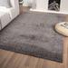 Black 87 x 62 x 1 in Area Rug - Latitude Run® Solid Color Power Loom 5' x 7' Area Rug in Polypropylene | 87 H x 62 W x 1 D in | Wayfair