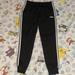 Adidas Pants | Adidas Tapered Black & 3 White Stripe Track Pants | Color: Black/White | Size: M