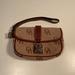 Dooney & Bourke Bags | Dooney & Bourke Brown Leather Jacquard Lock Wristlet | Color: Brown | Size: 6.5" X 4.5"