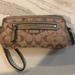 Coach Bags | Coach Daisy Outline Signature Double Zip Wristlet | Color: Brown/Pink | Size: 4”H X 8”L