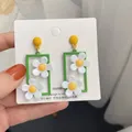 Boucles d'oreilles à clipser en forme de fleur carrée évidée verte pour femmes bijoux géométriques