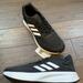 Adidas Shoes | Adidas Duramo 10 Wide Running Shoes Men's Size 11 Black/ White Gy3855 | Color: Black/White | Size: 11