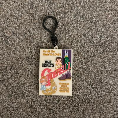Disney Accessories | Disney Movie Poster Figure Bag Clip | Color: Pink/White | Size: One Size