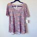 Lularoe Tops | Lularoe Medium Perfect T. Short Sleeve With A Flowy Bottom. | Color: Orange/Pink | Size: M