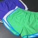 Nike Shorts | Nike Set Of 2 Dri Fit Women's Athletic Running Shorts. Purple & Green Size M | Color: Green/Purple | Size: M