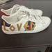 Gucci Shoes | Great Used Condition - Gucci “Loved” Sneakers/Tennis Shoes White Dust Bags & Box | Color: White | Size: 37.5