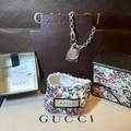 Gucci Jewelry | Gucci Icon Gucci Logo Silver Round Trademark Charm Bracelet | Color: Silver | Size: Os