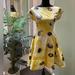 Kate Spade Dresses | Gently Used Kate Spade Daisy Fiorella Dress. Size 2 | Color: Black/Yellow | Size: 2
