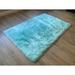 Blue 48 x 30 x 3 in Area Rug - Everly Quinn Mar Vista Solid Color Machine Woven Faux Sheepskin Area Rug in Sheepskin/Faux Fur | Wayfair