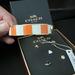 Coach Jewelry | Coach Orange And White Striped Bangle And Brand New Coach Stardust Earring Set | Color: Orange/White | Size: Os