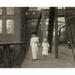 Hine: Child Labor 1913. /Na Woman And A Girl Walking Home From Working At The Muscogee Mills Columbus Georgia. Photograph By Lewis Hine April 1913. Poster Print by Granger Collection