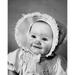 Close-up of a baby girl smiling Poster Print (18 x 24)