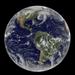 March 31 2014 - Satellite view of full Earth showing low pressure systems in the eastern Pacific Ocean over the nation s Heartland and in