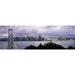 Bridge across a bay with city skyline in the background Bay Bridge San Francisco Bay San Francisco California USA Poster Print (18 x 6)