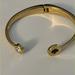 Kate Spade Jewelry | Kate Spade Bracelet Goldtone Spring Cuff 1 Rhinestone 1 Preowned | Color: Black/Gold | Size: Os