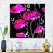 Designart 'Abstract Red Flower Detail On Black I' Traditional Metal Wall Clock