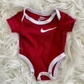 Nike One Pieces | Nike Baby Boys Red Logo Short Sleeve Onesie Bodysuit Size Newborn | Color: Red/White | Size: Newborn