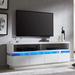 Ivy Bronx Ahto 66" W TV Stand for TVs up to 75" w/ LED Light, Gaming Entertainment Center w/ Sliding Drawers in White | Wayfair