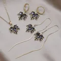 Boucles d'oreilles pendantes noires sur cuir chevelu d'érable pour femmes bijoux de mode coréens