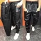 Pantalon en similicuir taille élastique pour hommes jogging poches zippées streetwear noir
