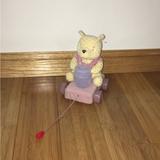 Disney Toys | Disney Baby Classic Winnie The Pooh Pull Along Toy Plush | Color: Pink/Yellow | Size: Small Size Plush