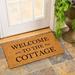 Trinx Welcome to the Cottage 16 in. x 28 in. Non-Slip Outdoor Door Mat Coir in Brown/Orange/White | 28 H x 16 W x 0.56 D in | Wayfair