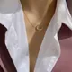 Colliers pendentif croissant de lune pour femme acier inoxydable or et argent document