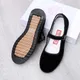 Chaussures simples en tissu noir pour femmes chaussures de travail fond de tendon de boeuf