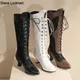 Femmes victoriennes pointues Parker mi-mollet bottes en cuir dentelle évider Punk à lacets étrange