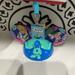 Disney Holiday | Disney Parks Alice In Wonderland Ear Hat Ornament Artist: Costa Alavezos Nwt | Color: Blue/Purple | Size: Os