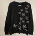 Disney Sweaters | Disney Minnie Mouse Black Dotted Bows Pullover Sweater Size Xxl | Color: Black/White | Size: Xxl