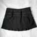 Athleta Shorts | Athleta Women’s Swagger Zip Pocket Tennis Running Skirt/Shorts Euc Sz Xxs | Color: Black/Purple | Size: Xxs