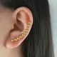 Manchette d'oreille en acier inoxydable pour femmes et filles clip de document doré boucles