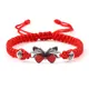 Bracelet porte-bonheur papillon rouge pour femmes et hommes tressé à la main cordon réglable rouge