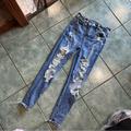 American Eagle Outfitters Jeans | American Eagle Distressed Medium Wash Next Level Stretch Hi-Rise Jegging Jeans | Color: Blue/White | Size: 2