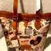 Dooney & Bourke Bags | Dooney And Bourke Disney 55th Anniversary Bucket Bag ~ Nwt. | Color: Cream/Tan | Size: Os